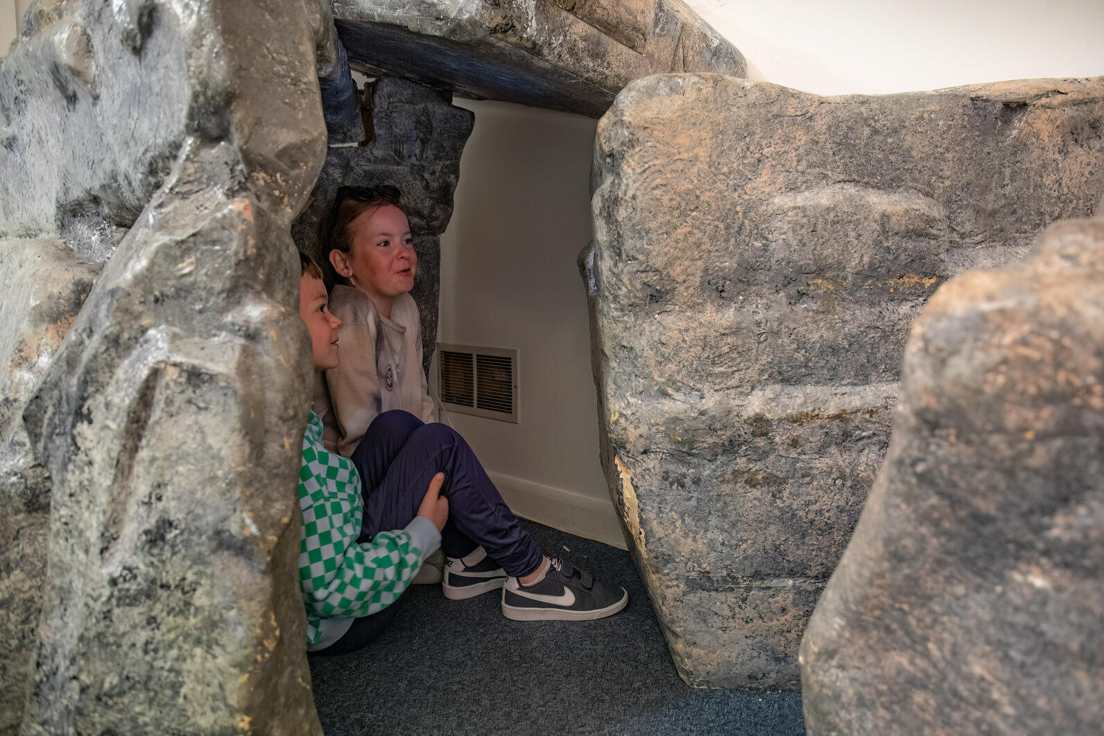 People exploring the Project Puffin Visitor Center's puffin burrow People exploring the Project Puffin Visitor Center's puffin burrow