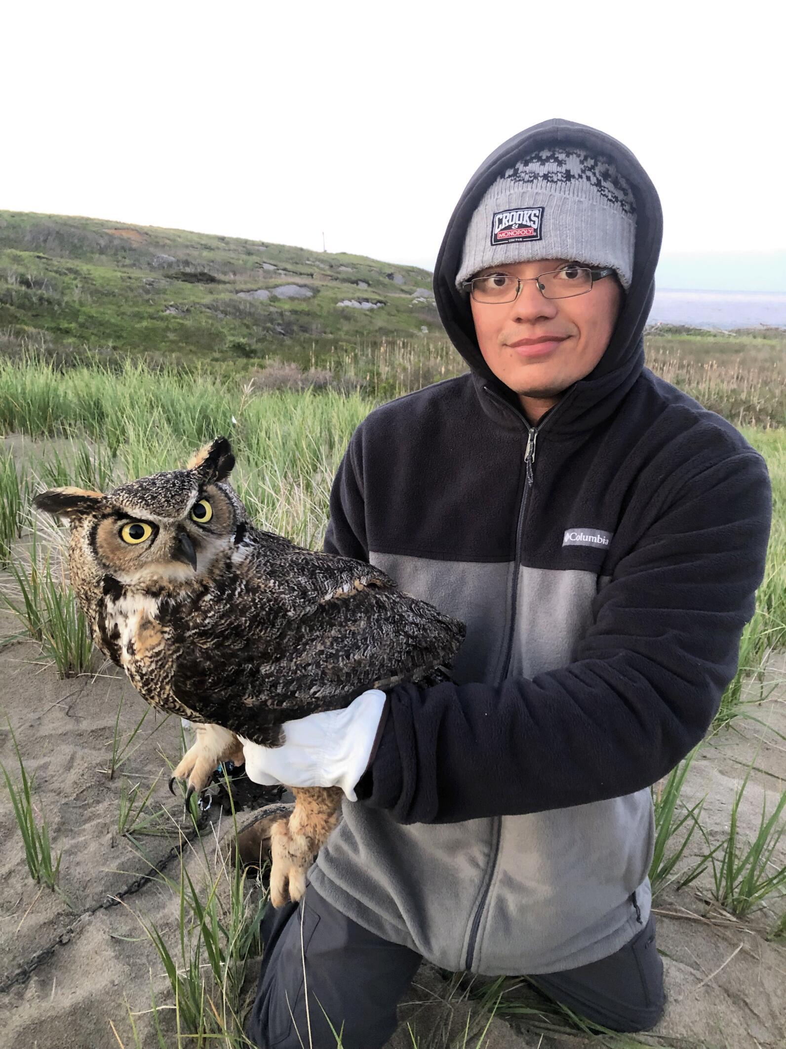 Jake Brown with Great-horned Owl