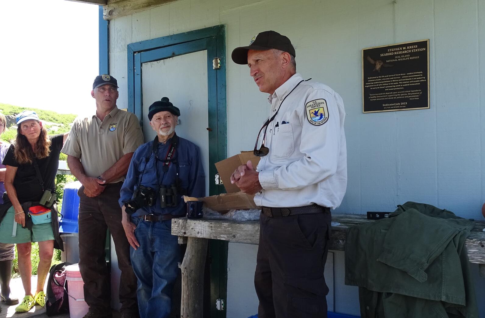 Brian Benedict of USFWS shares remarks during the plaque installation on Seal Island NWR